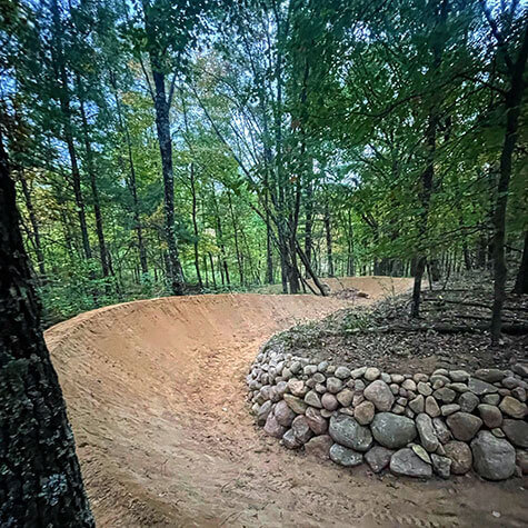 mountain-biking-flow-trail-berms-trailworx